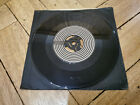 genesis invisible touch 7" vinyl record good condition