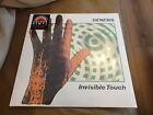 Genesis Invisible Touch 12" Limited Edition Orange Vinyl LP New and Sealed